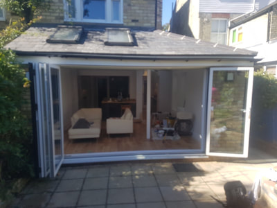 Kitchen extension in Cambridge finished with beautiful bi fold doors